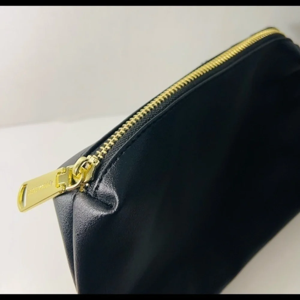 Steve Madden solid black makeup pouch or clutch